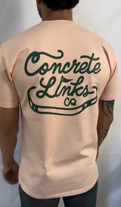 The Concrete Links Co "Classic Logo" tee - light pink & racing green