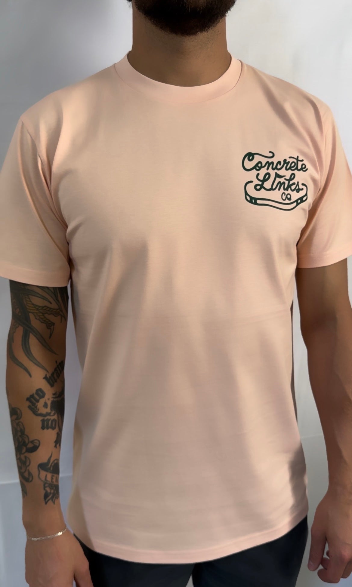 The Concrete Links Co "Classic Logo" tee in light pink & raching green