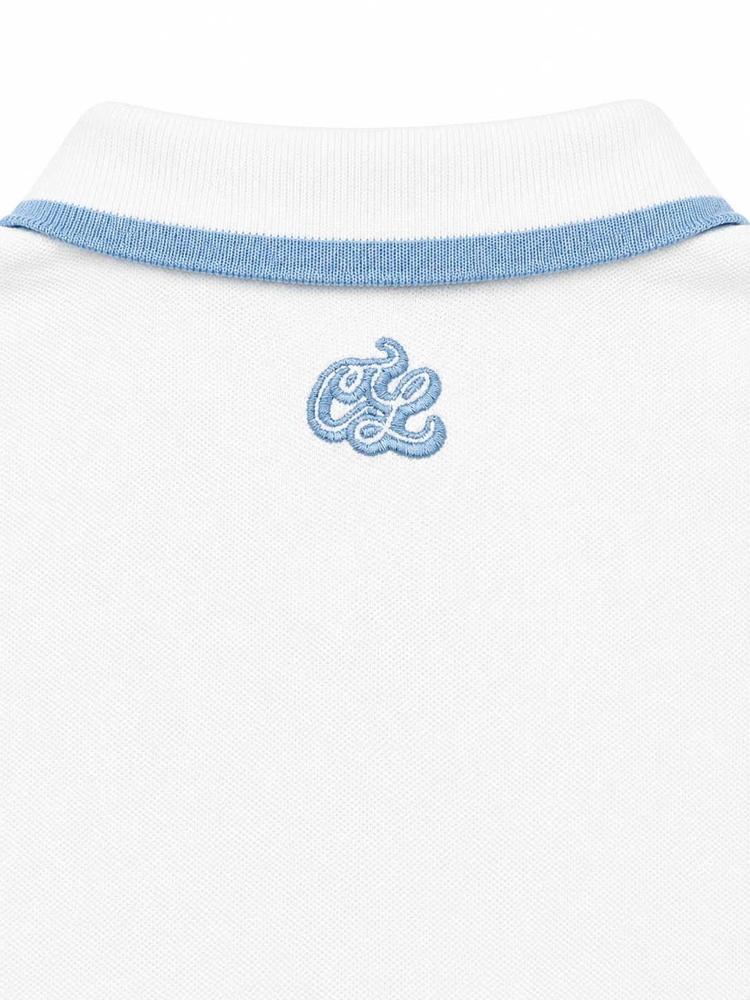 White polo shirt with blue collar and embroidered logo on a white background